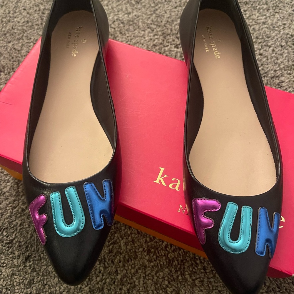 Kate Spade New York size 11 black flat shoes.